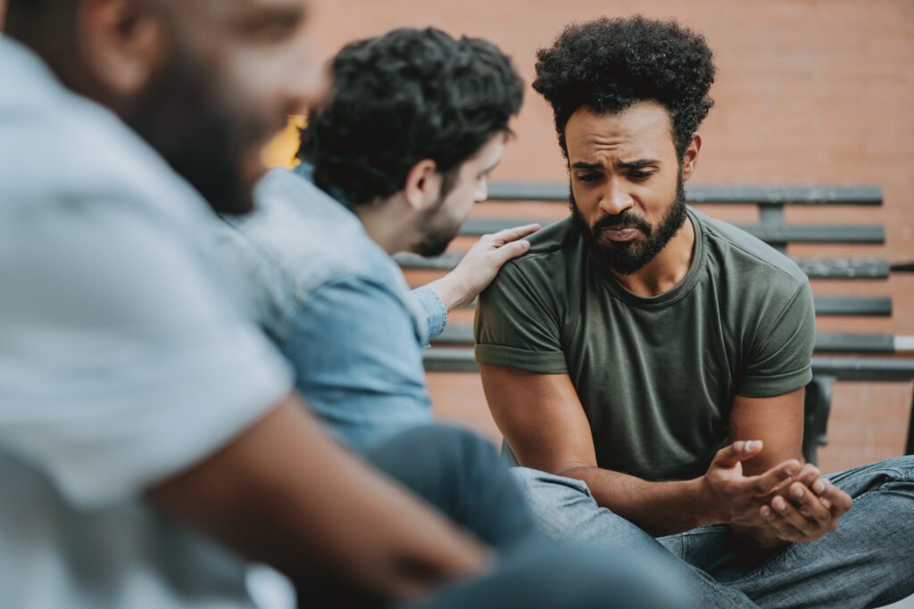 What is the difference between an intensive outpatient program and a partial hospitalization program?
